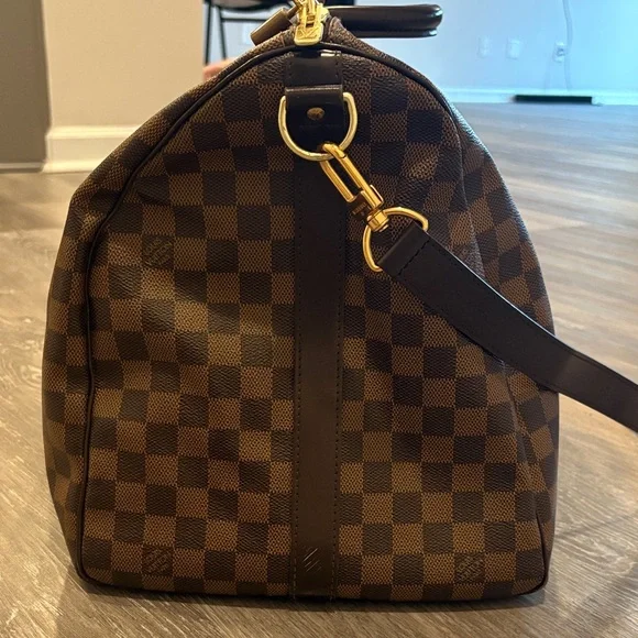 Authentic Louis Vuitton Keepall Bandoulière 55 - Picture 12 of 17